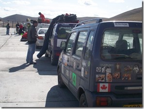 Line of Mongol Rally vehicles waiting for paperwork to clear
